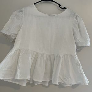 White peplum top with ruched sleeves & keyhole button detail on back